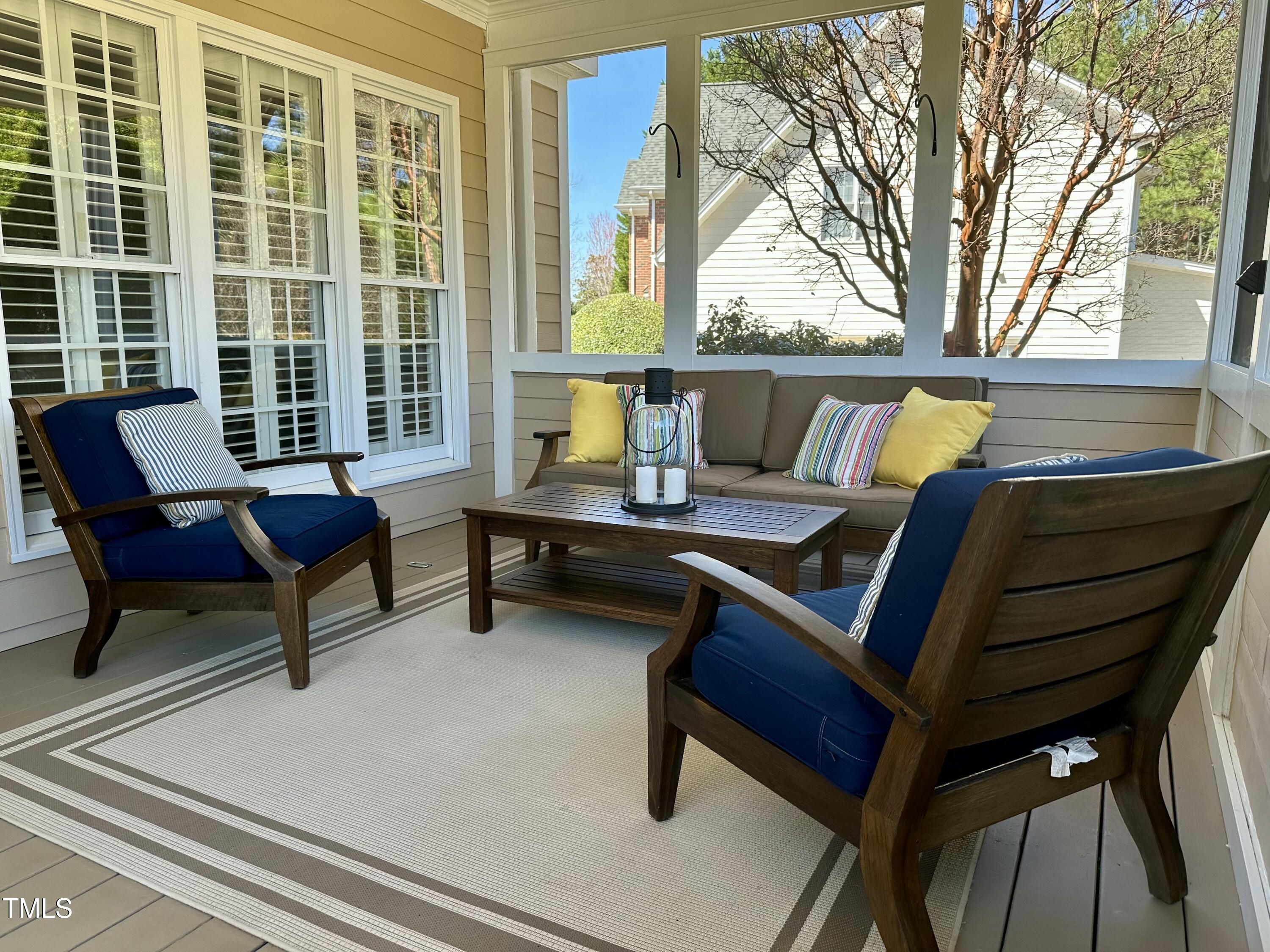 3708 Wesley Ridge Drive Apex, NC 27539 - Photo 39 of 48 a outdoor living space with furniture and a potted plant