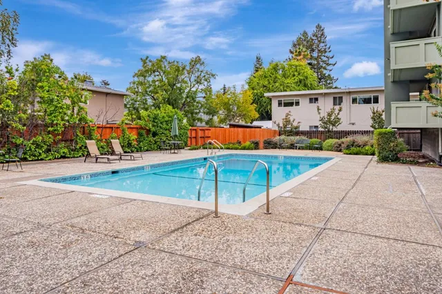 a view of a backyard with a patio