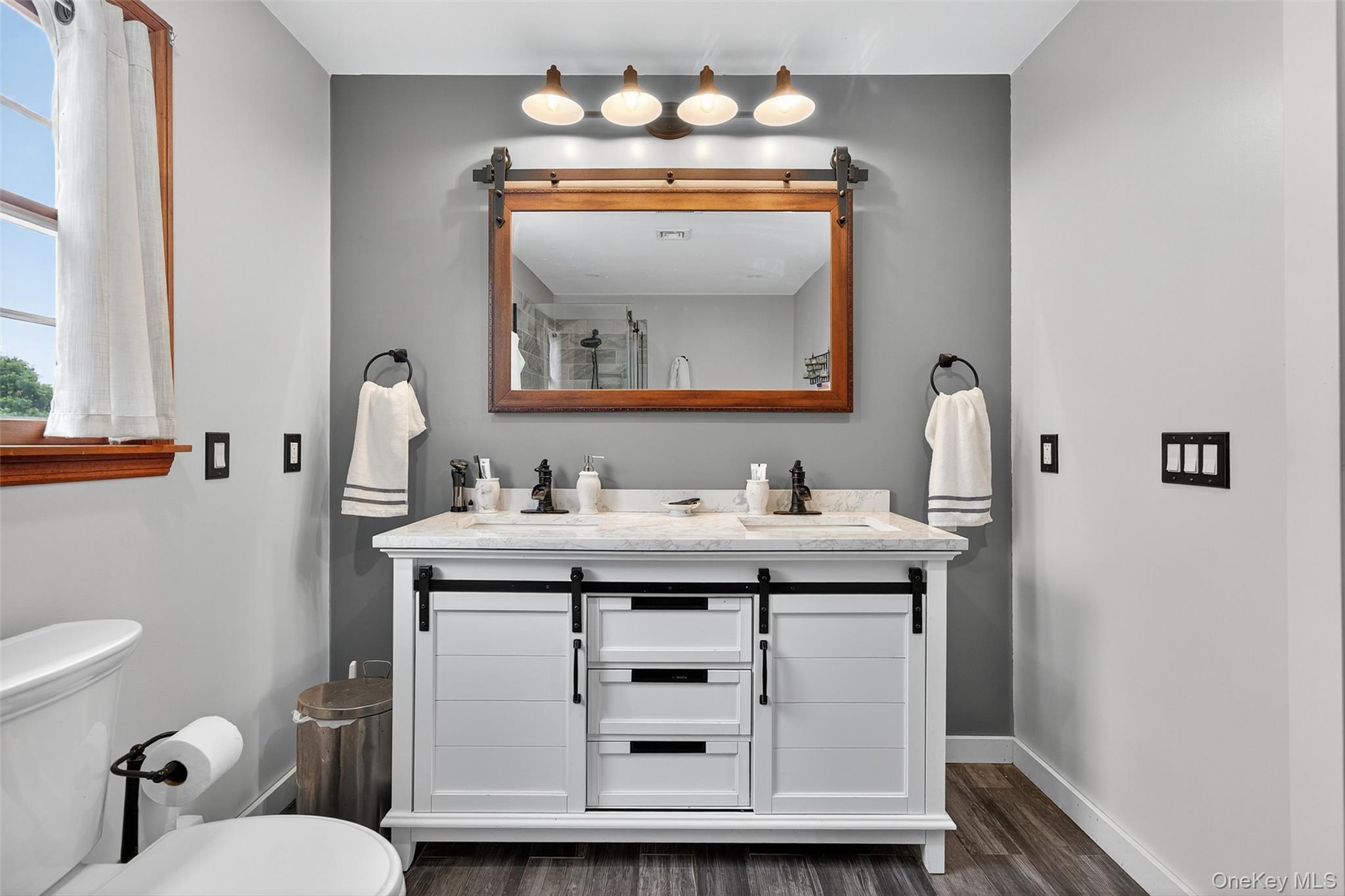 214 Dubois Road Gardiner, NY 12561 - Photo 22 of 38 a bathroom with a sink mirror and toilet