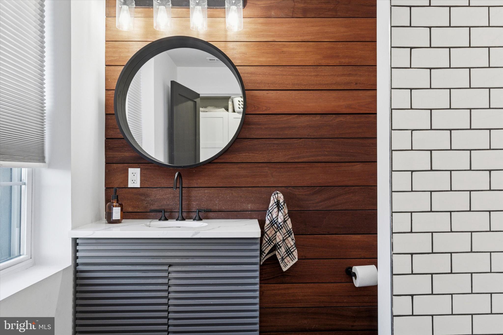 2694 Bridge Street Philadelphia, PA 19137 - Photo 14 of 41 a bathroom with a sink and a mirror