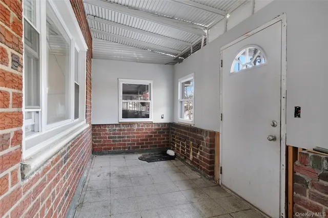 a view of front door with furniture