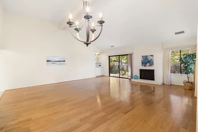 a kitchen with counter top space cabinets and appliances