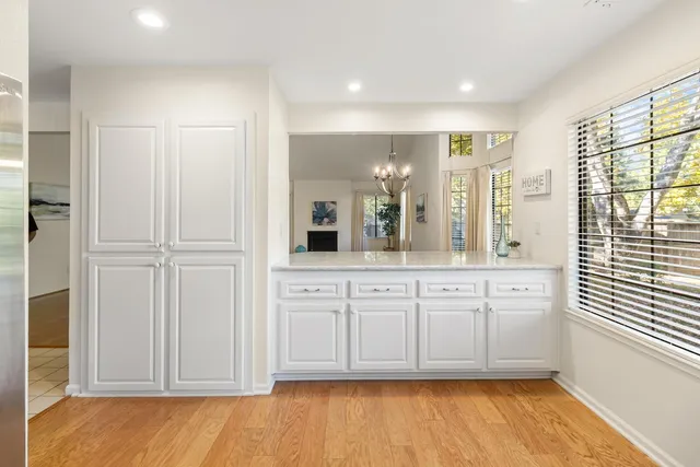 a bathroom with a tub a sink and a shower