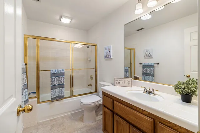 a view of a storage & utility room with cabinets