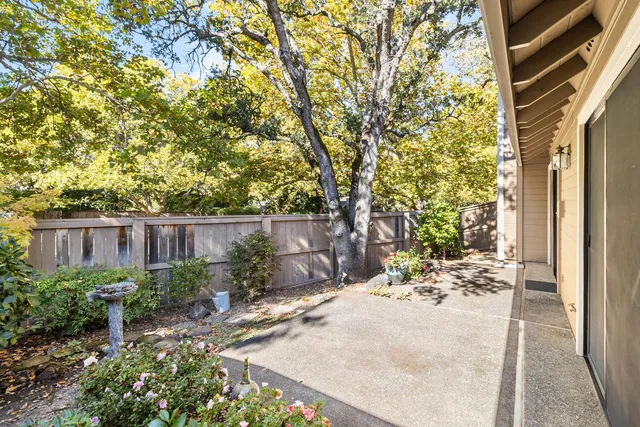 a backyard of a house with lots of green space