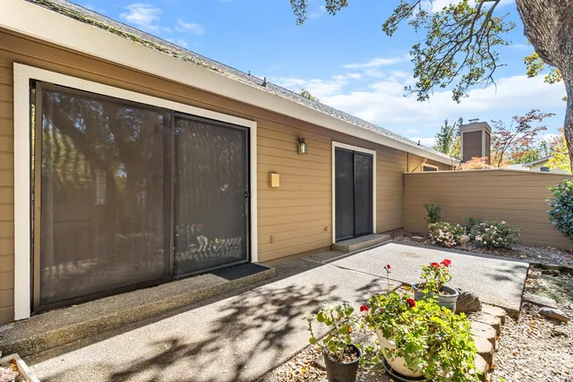 a view of backyard with green space
