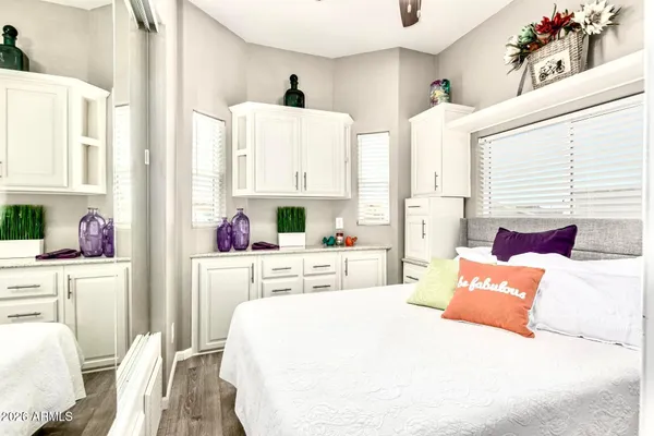 a bed room with a bed and a window