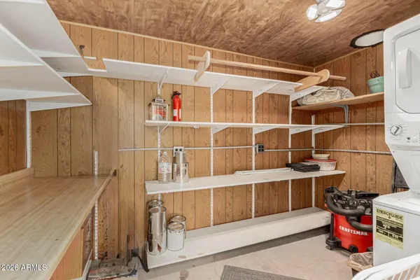 a view of a balcony with shelves