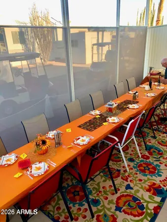 a view of a balcony dining area