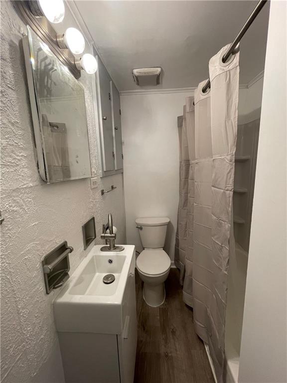 218 Four Mile Run, Unit 1 Pittsburgh, PA 15207 - Photo 12 of 14 a bathroom with a sink toilet and shower