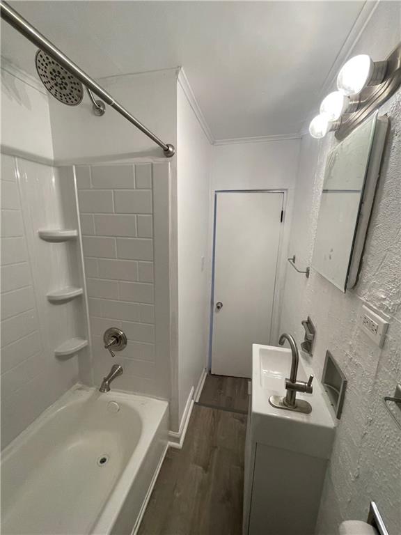 218 Four Mile Run, Unit 1 Pittsburgh, PA 15207 - Photo 13 of 14 a bathroom with a sink a mirror and a bathtub