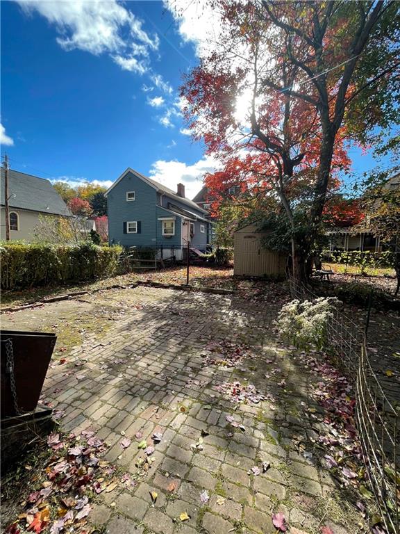 218 Four Mile Run, Unit 1 Pittsburgh, PA 15207 - Photo 14 of 14 a view of a yard with a tree