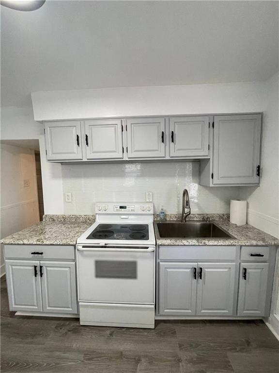 218 Four Mile Run, Unit 1 Pittsburgh, PA 15207 - Photo 7 of 14 a kitchen with granite countertop white cabinets and white appliances