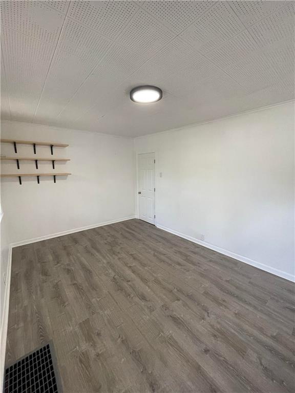 218 Four Mile Run, Unit 1 Pittsburgh, PA 15207 - Photo 9 of 14 a view of a room with wooden floor