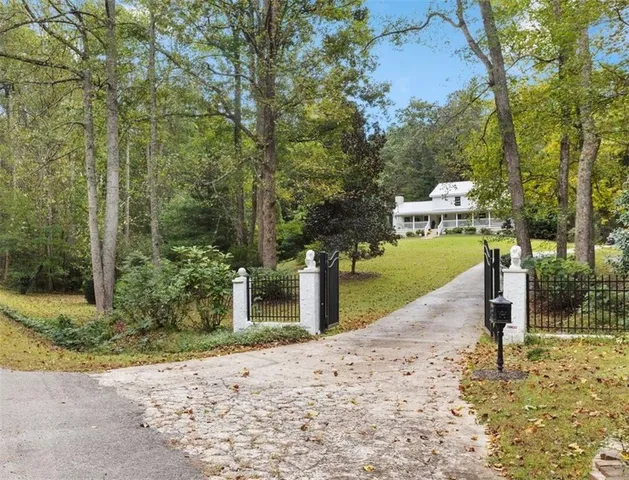 a view of a road with trees