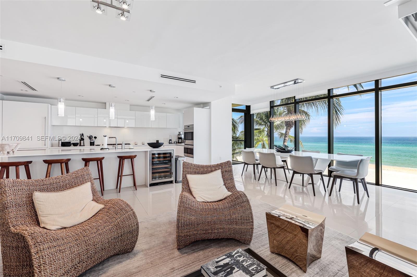 2205 South Surf Road, Unit 3A Hollywood, FL 33019 - Photo 14 of 58 a living room with furniture and a table