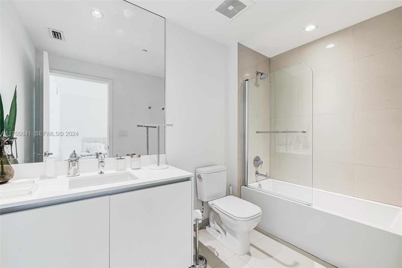 2205 South Surf Road, Unit 3A Hollywood, FL 33019 - Photo 26 of 58 a bathroom with a sink a toilet and shower