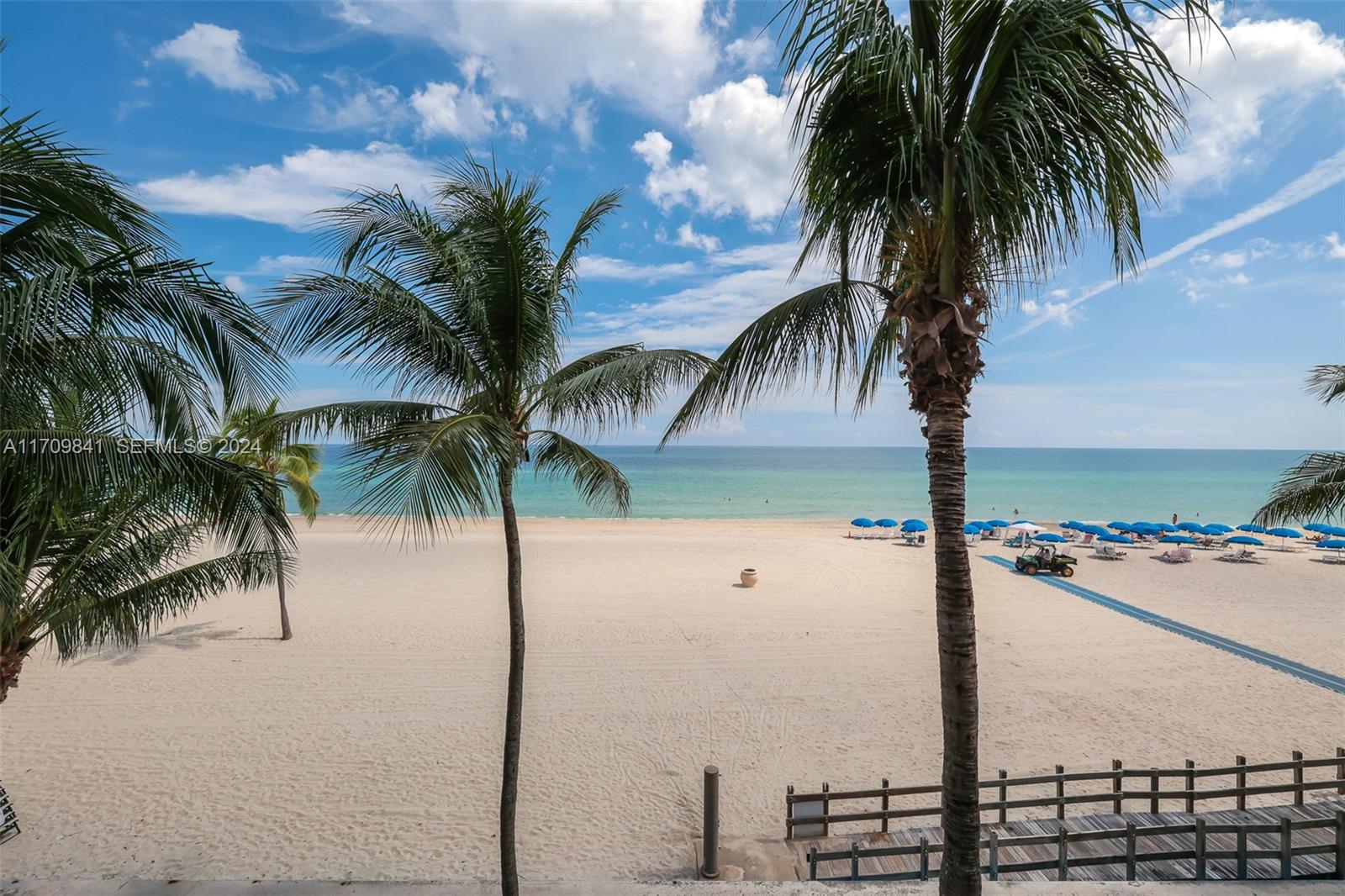 2205 South Surf Road, Unit 3A Hollywood, FL 33019 - Photo 32 of 58 a view of ocean with palm trees