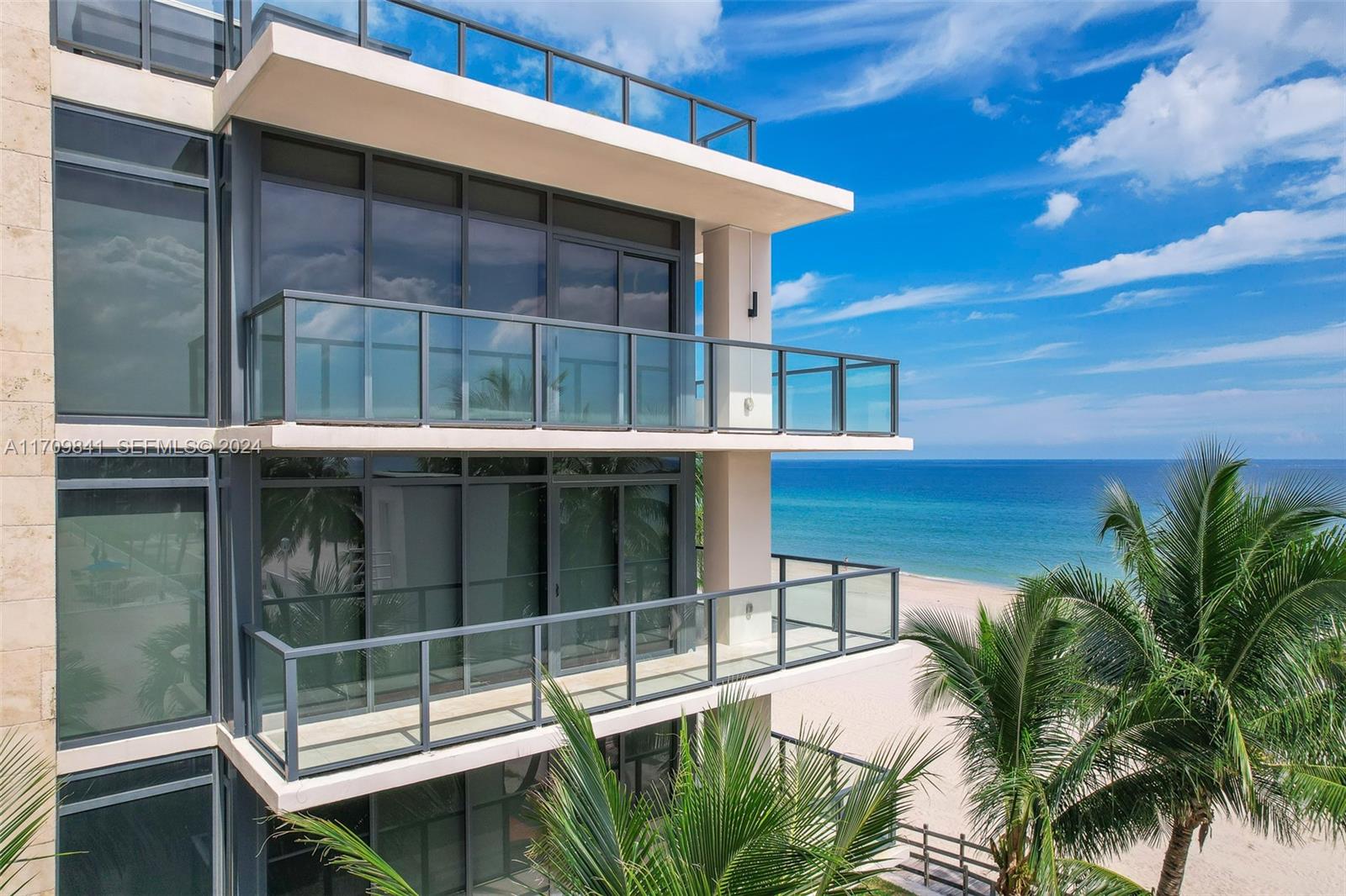 2205 South Surf Road, Unit 3A Hollywood, FL 33019 - Photo 47 of 58 a balcony with table and chairs