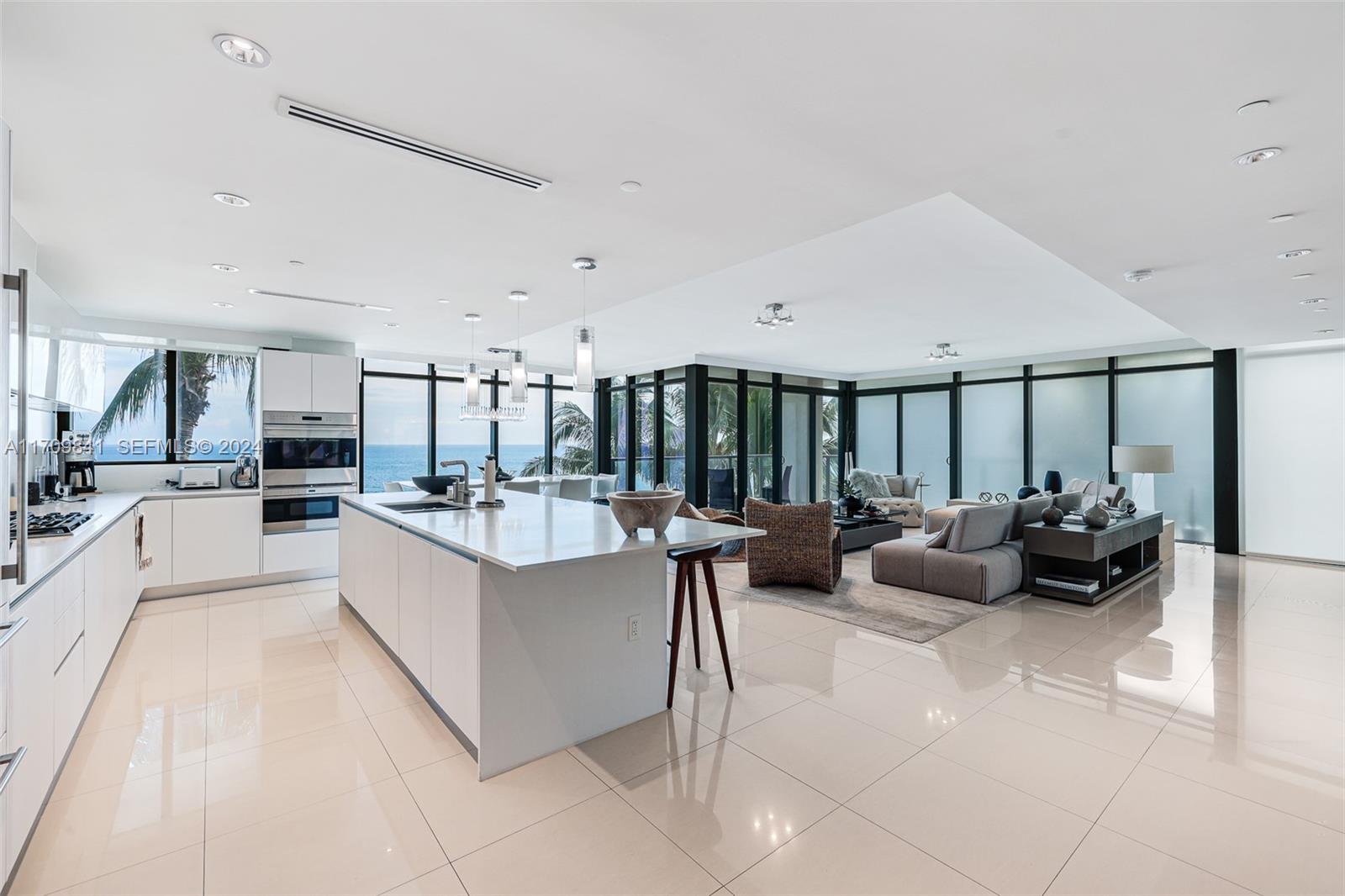 2205 South Surf Road, Unit 3A Hollywood, FL 33019 - Photo 7 of 58 a living room with furniture and a large window