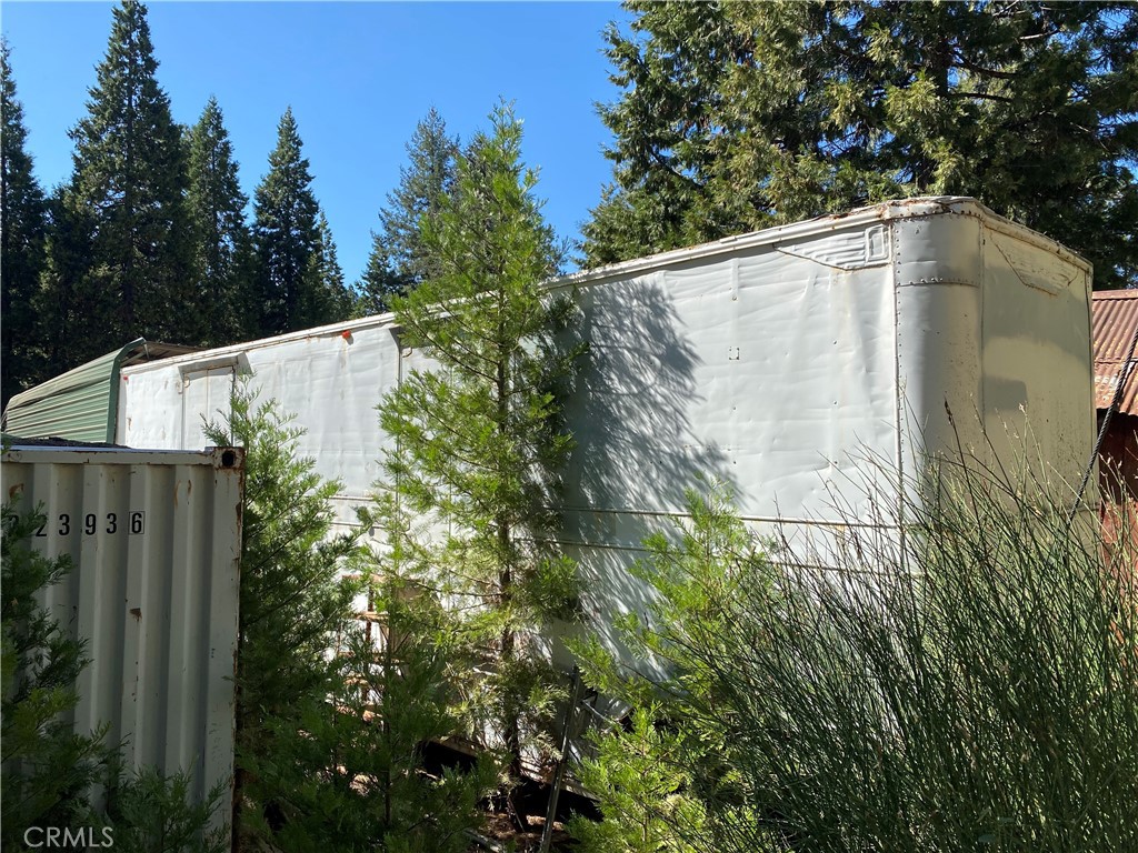 14650 Nimshew Road Magalia, CA 95954 - Photo 20 of 22 a backyard of a house with lots of green space