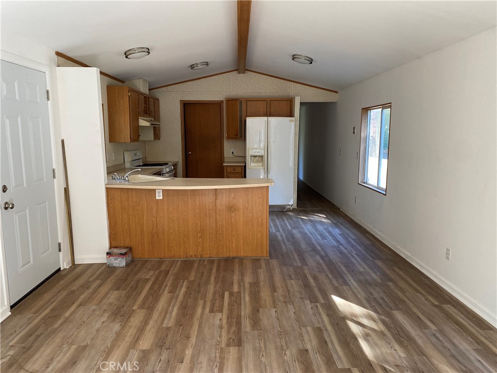 14650 Nimshew Road Magalia, CA 95954 - Photo 5 of 22 a view of kitchen with cabinets and wooden floor