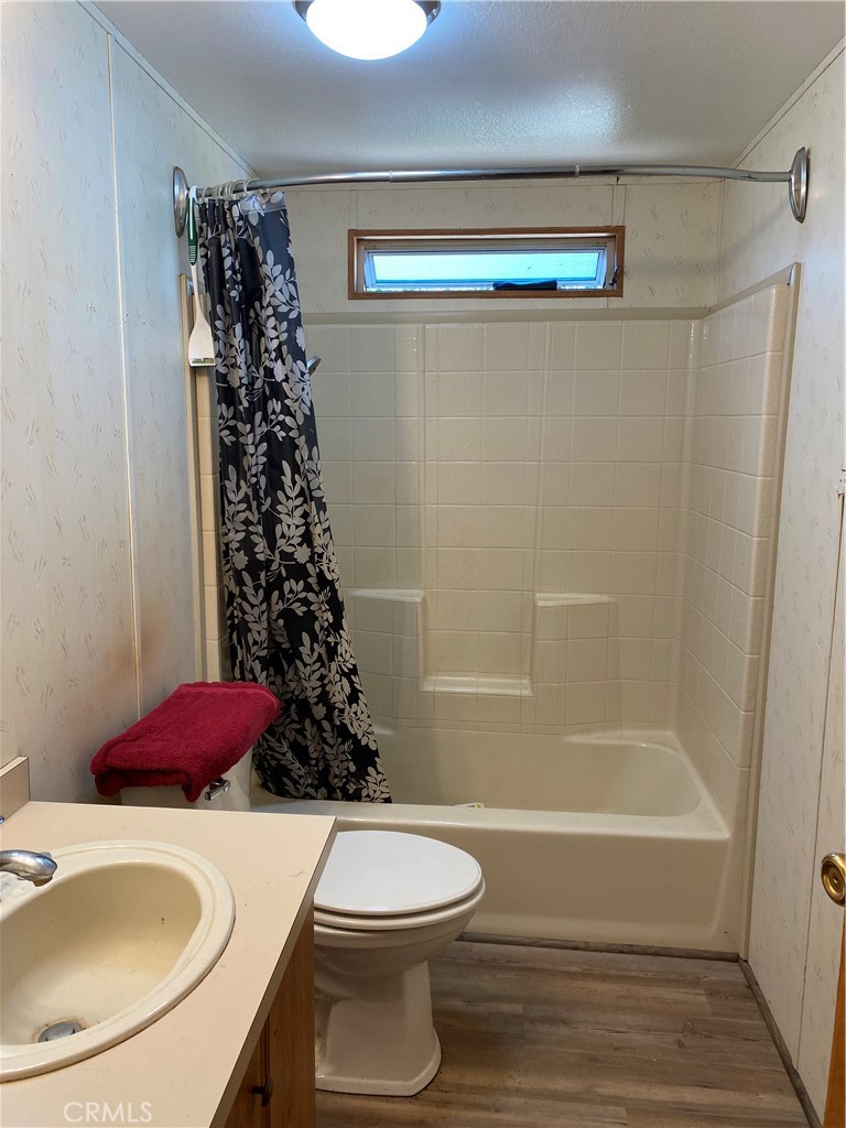 14650 Nimshew Road Magalia, CA 95954 - Photo 10 of 22 a bathroom with a sink a toilet and a bathtub