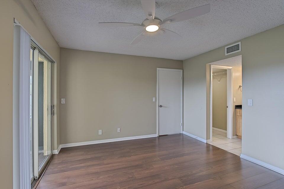 6284 La Costa Drive, Unit E Boca Raton, FL 33433 - Photo 12 of 24 Master Bedroom