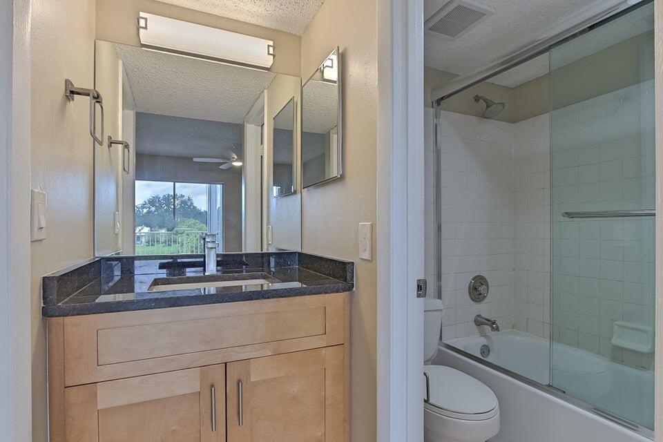 6284 La Costa Drive, Unit E Boca Raton, FL 33433 - Photo 14 of 24 Master bathroom