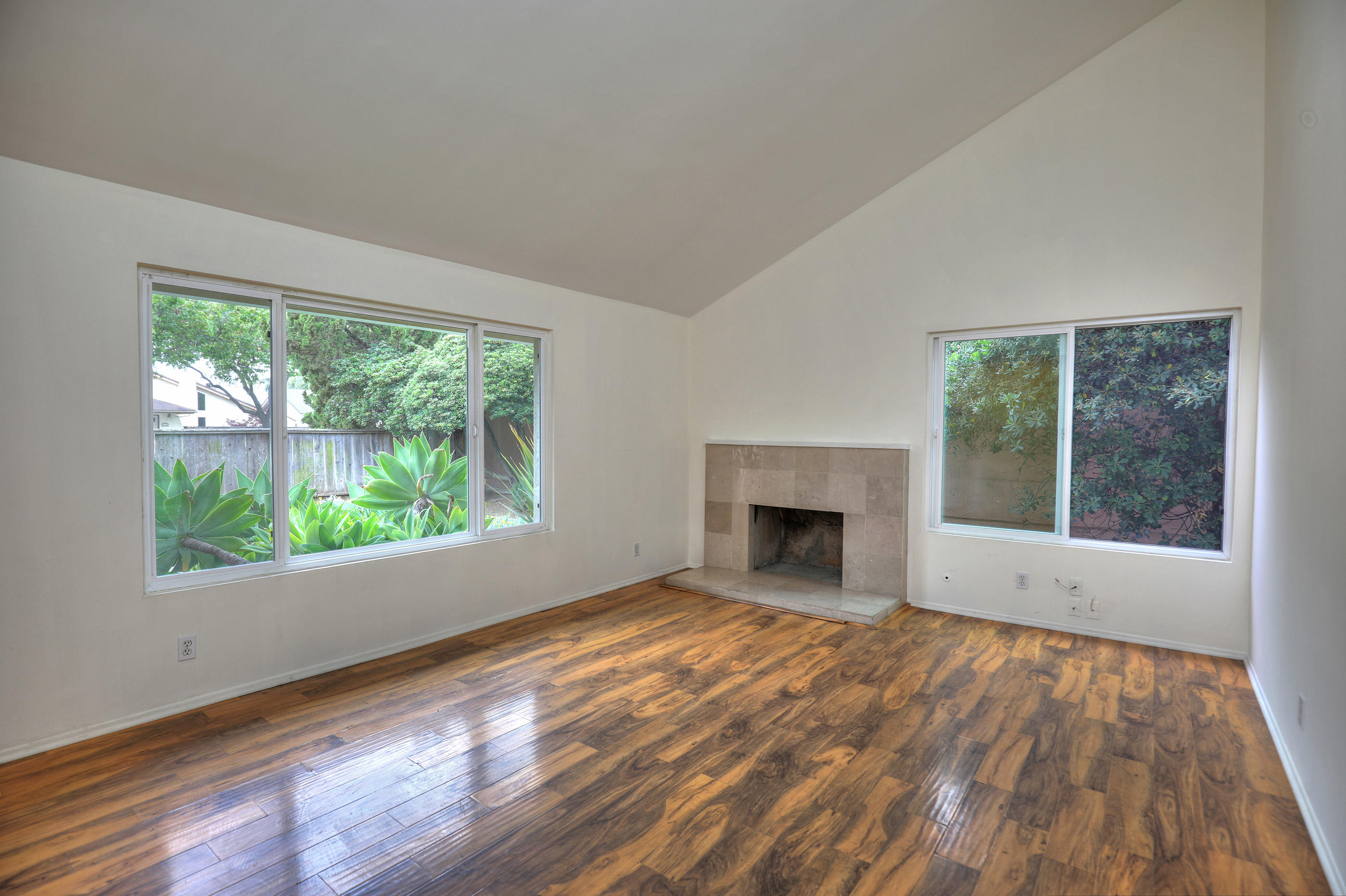 7320 Davenport Road Goleta, CA 93117 - Photo 3 of 18 a view of empty room with window and fireplace