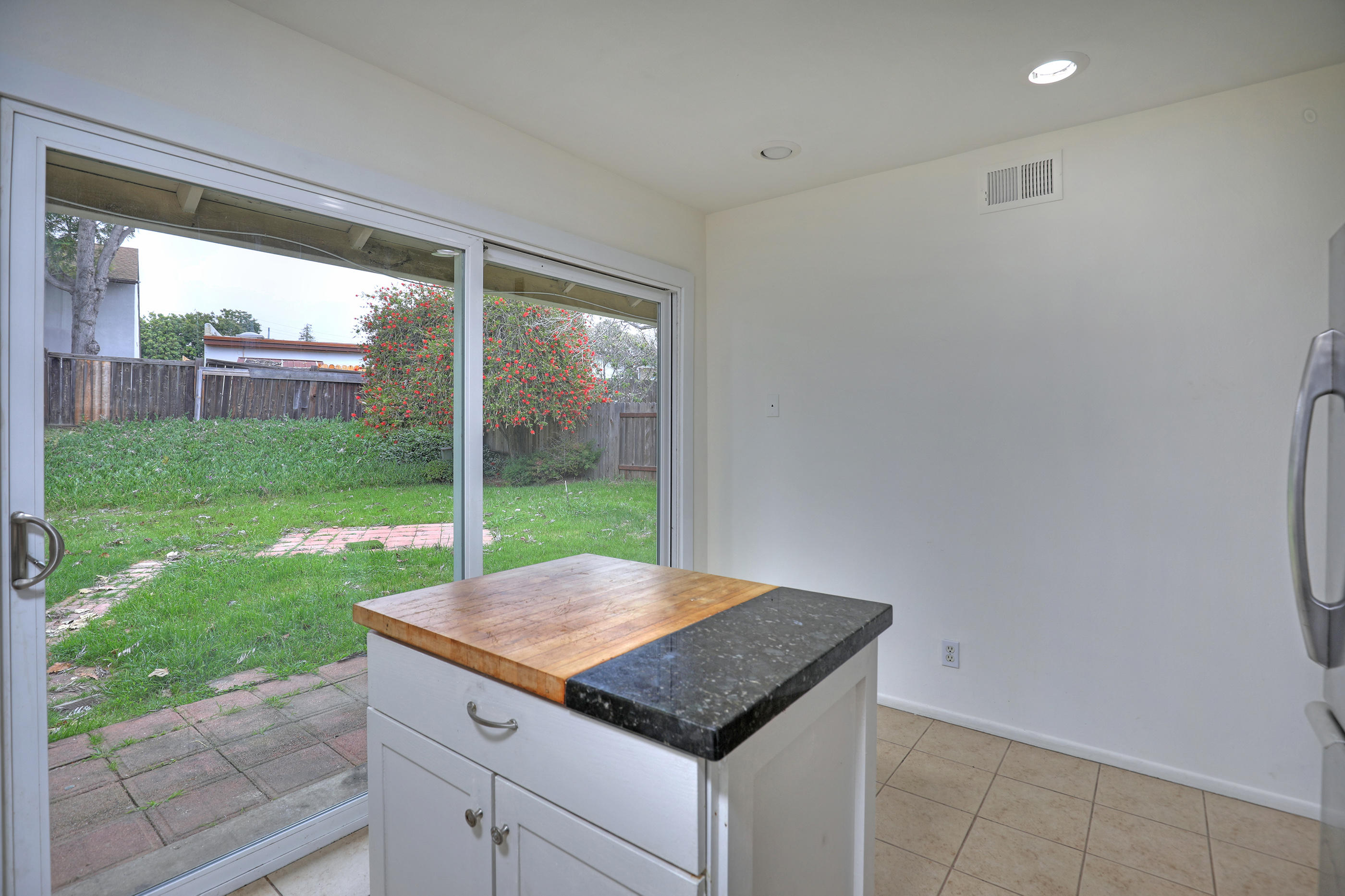 7320 Davenport Road Goleta, CA 93117 - Photo 8 of 18 a view of kitchen with kitchen island a sink and a wooden floor