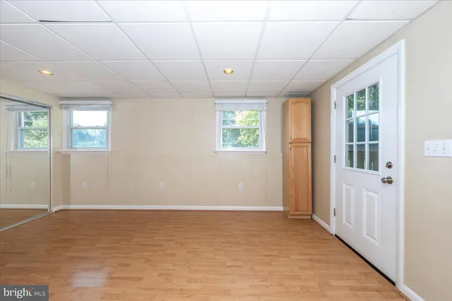 a bathroom with a glass shower door