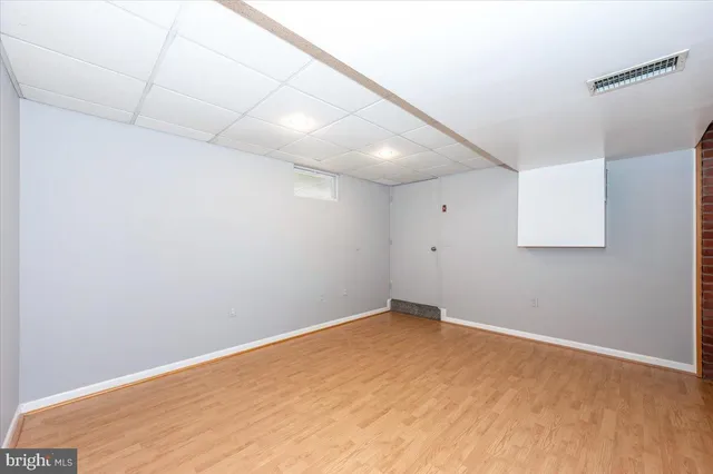 a view of yard with grass and trees