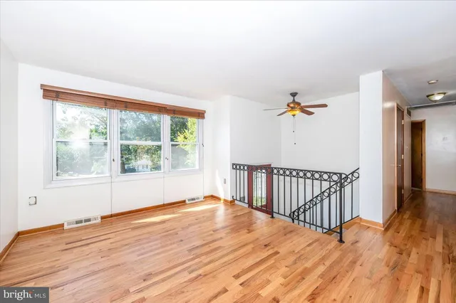 a kitchen with a stove a sink and a microwave