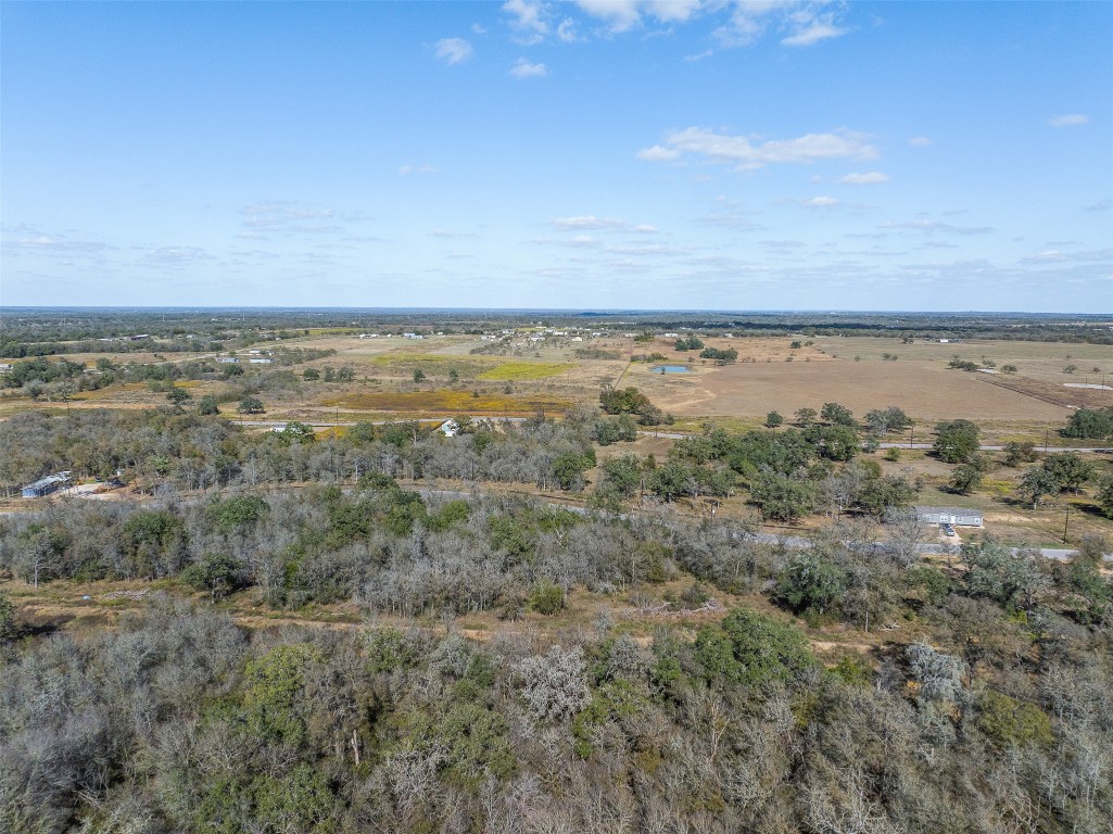 897 Ferguson Loop Dale Dale, TX 78616 - Photo 4 of 8 an aerial view of multiple house