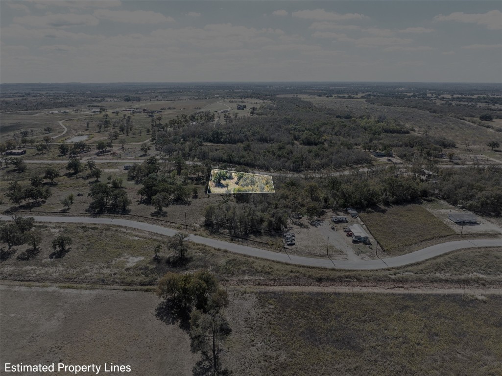 897 Ferguson Loop Dale Dale, TX 78616 - Photo 7 of 8 a view of a dry yard