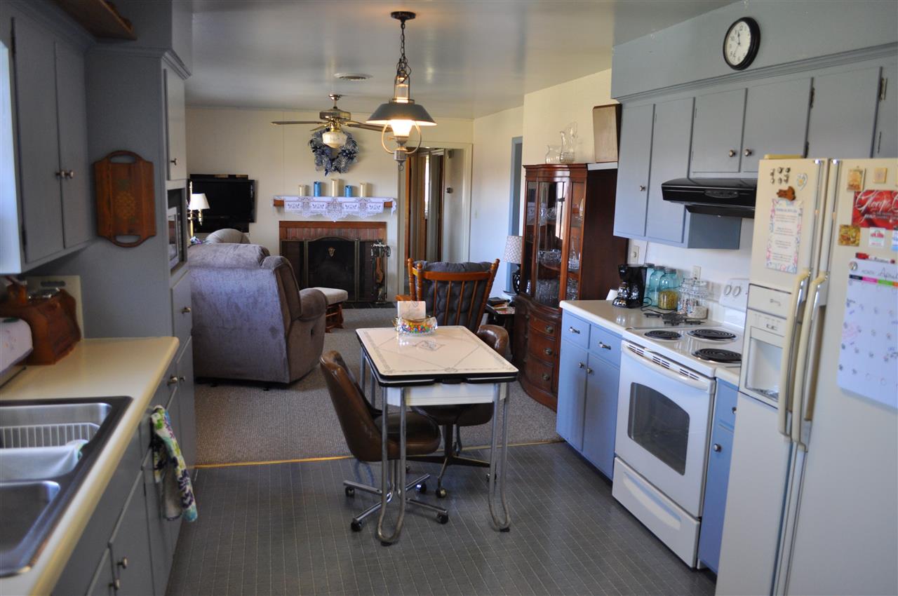 363 Varner Road Churchville, VA 24421 - Photo 12 of 17 a kitchen with stainless steel appliances a stove refrigerator sink and dining table