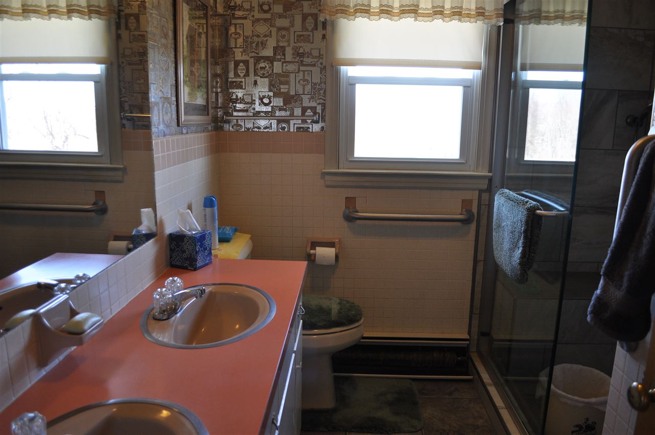 363 Varner Road Churchville, VA 24421 - Photo 15 of 17 a bathroom with a sink and mirror