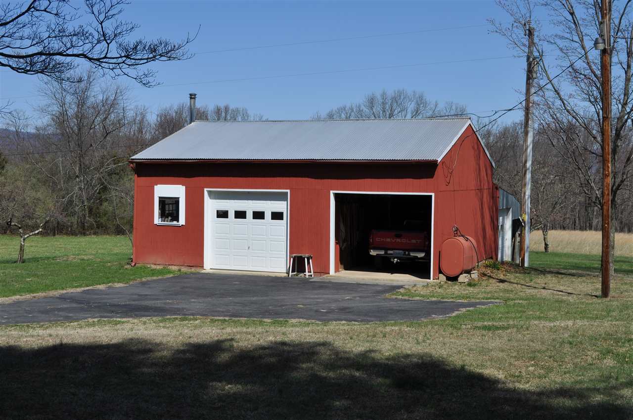 363 Varner Road Churchville, VA 24421 - Photo 4 of 17 a view of a house with a yard and a large tree