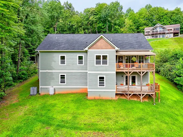 a group of chairs sitting in a room next to a window
