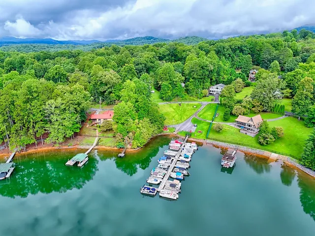 a view of a two chairs in the balcony
