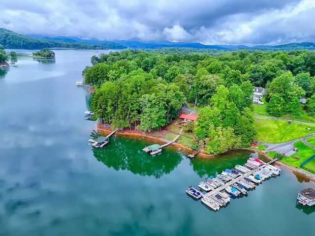 a living room with furniture fireplace and flat screen tv