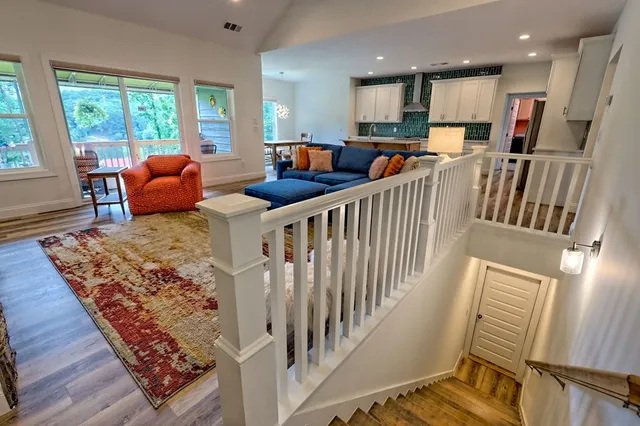 a bedroom with a bed and a desk