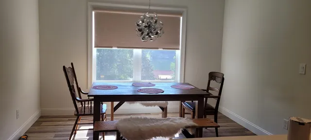 an entryway of a house with a view of bathroom