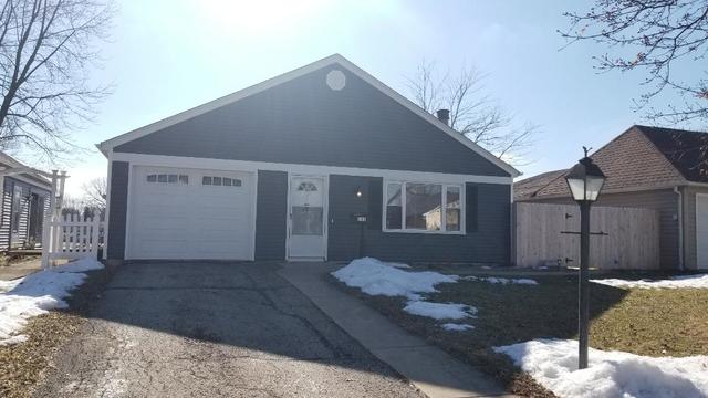 133 Heathgate Road Montgomery, IL 60538 - Photo 1 of 34 a front view of a house with a yard