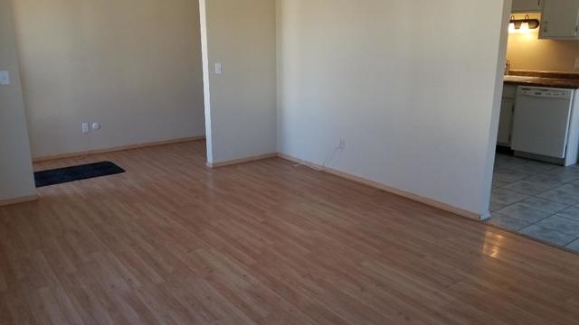 133 Heathgate Road Montgomery, IL 60538 - Photo 15 of 34 a view of empty room with wooden floor and fan