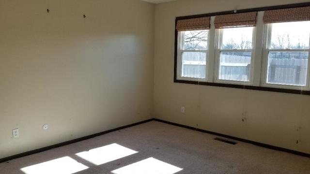 133 Heathgate Road Montgomery, IL 60538 - Photo 29 of 34 a view of an empty room with a window