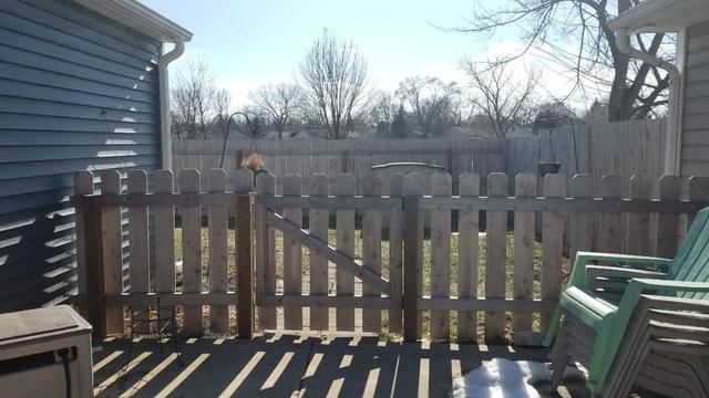 133 Heathgate Road Montgomery, IL 60538 - Photo 6 of 34 a view of a house with a backyard