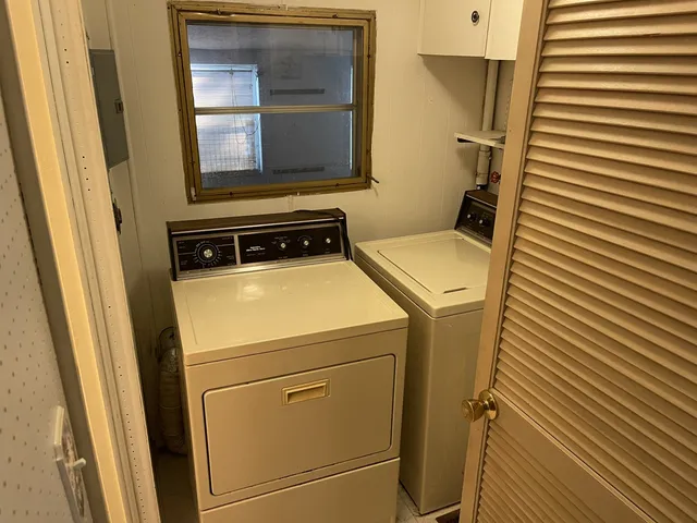 a bathroom with a sink a mirror and vanity