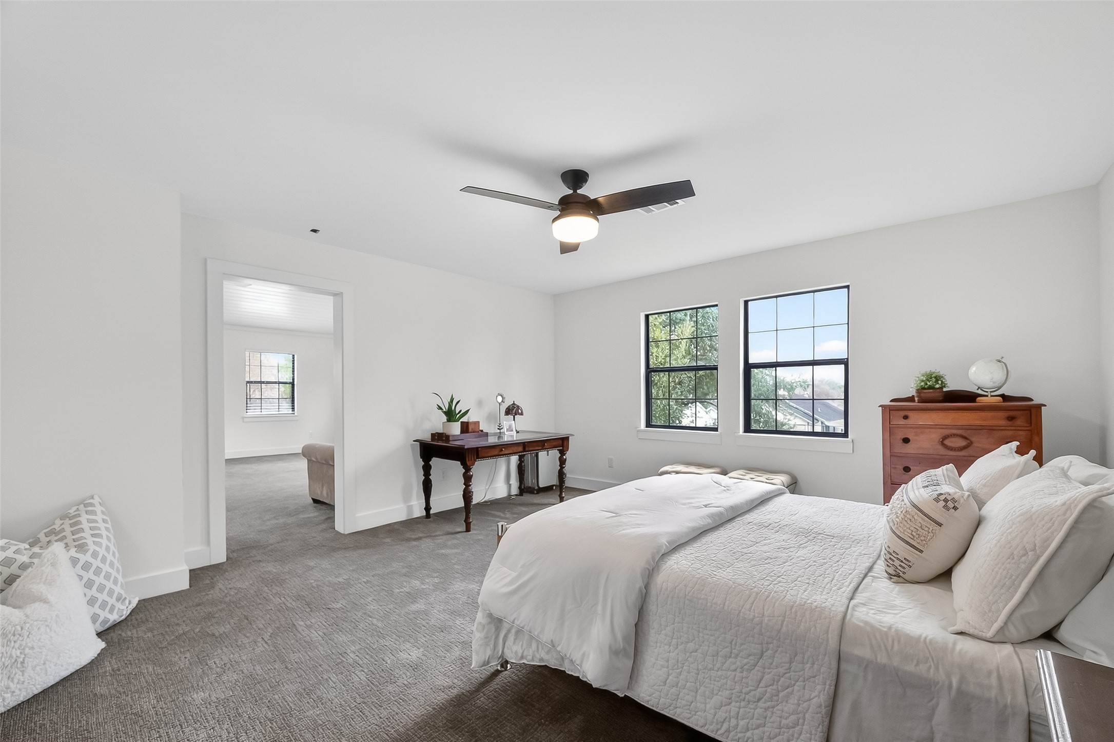 1808 Tabor Street Houston, TX 77009 - Photo 19 of 26 a bedroom with a bed and a window